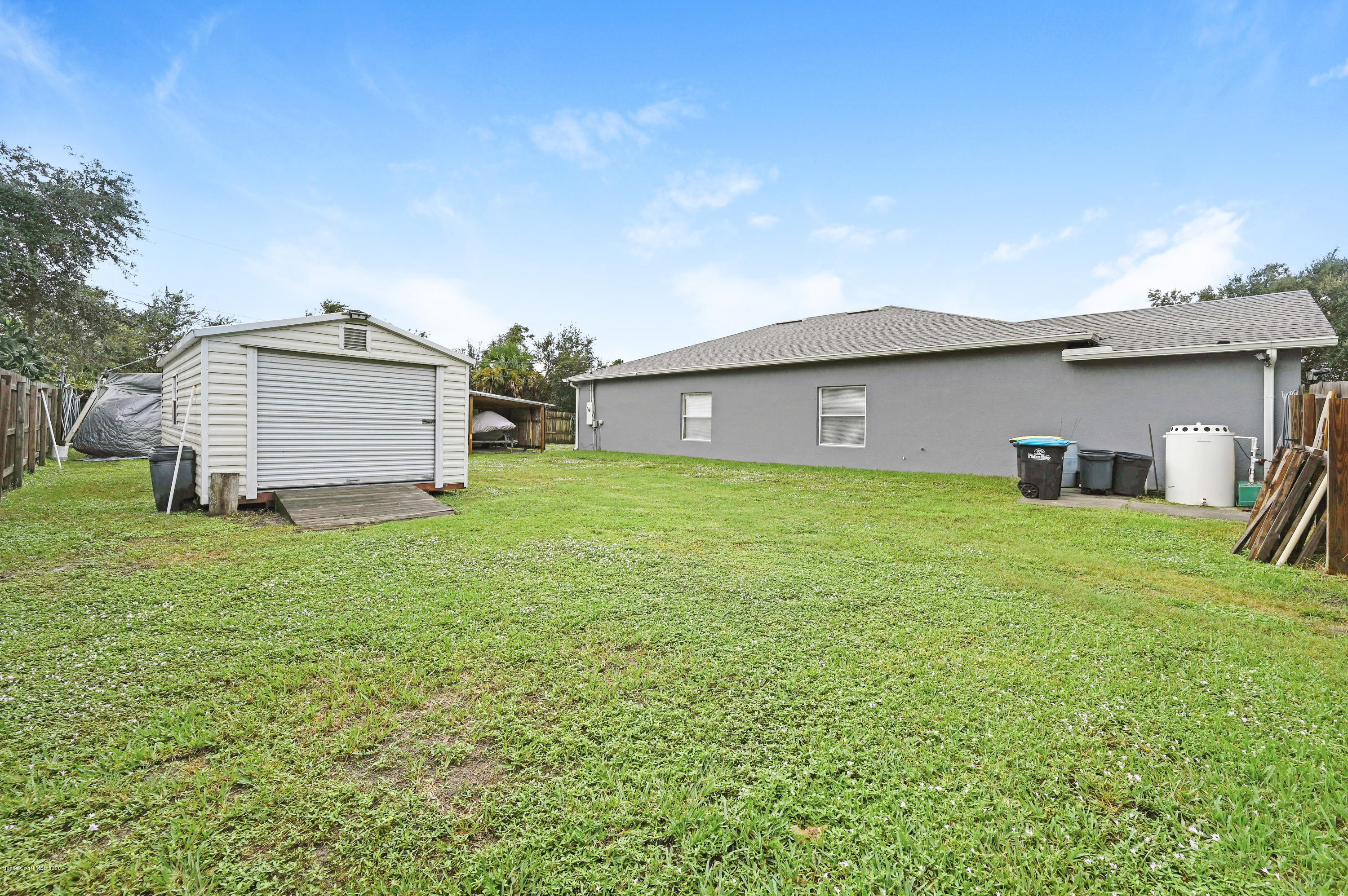 2865 Tishman Road Southeast Palm Bay, FL 32909 - Photo 13 of 34 side yard