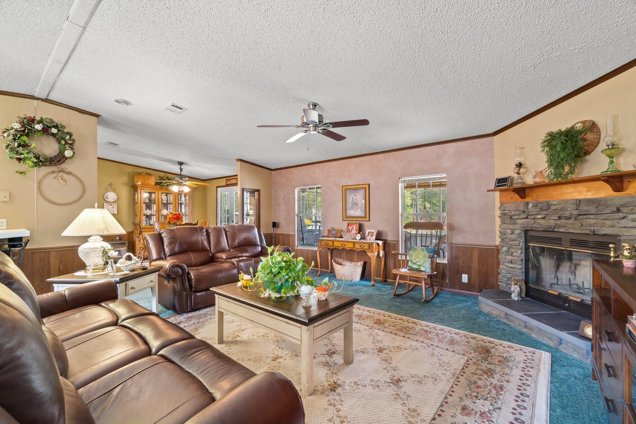 4281 Shell Landing Road Vernon, FL 32462 - Photo 13 of 55 a living room with furniture fireplace and window