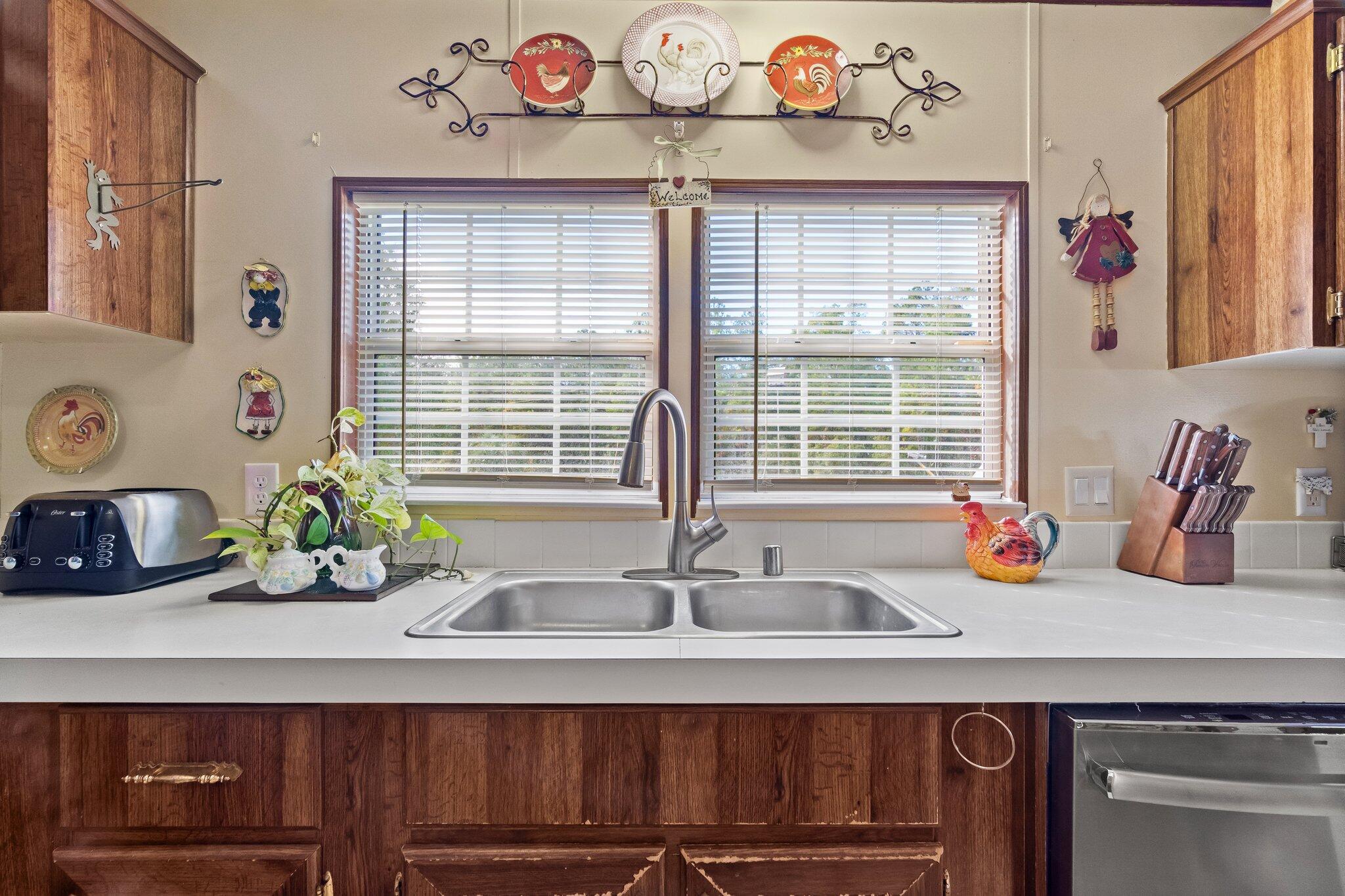 4281 Shell Landing Road Vernon, FL 32462 - Photo 18 of 55 a kitchen with a sink and a window