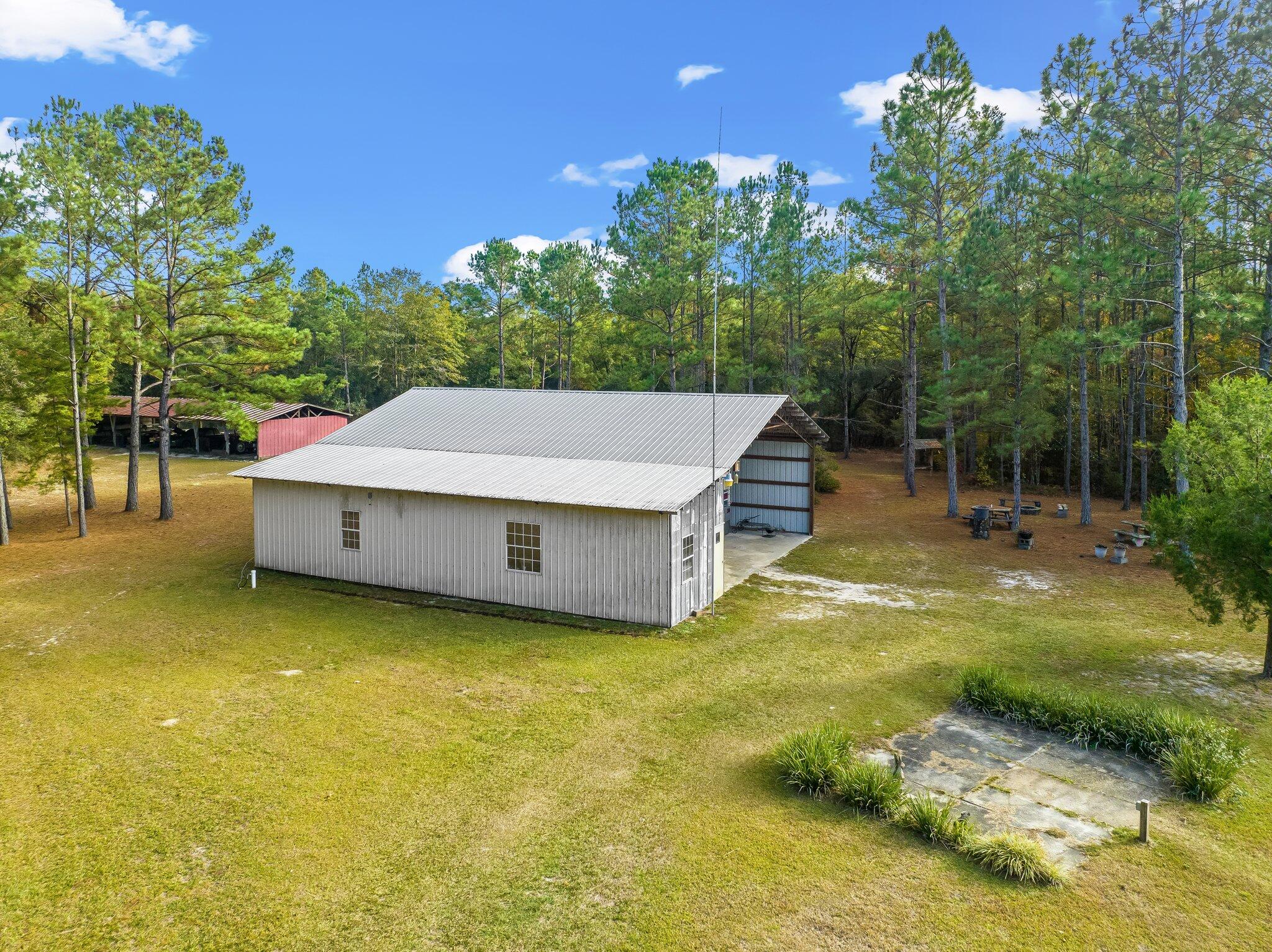 4281 Shell Landing Road Vernon, FL 32462 - Photo 6 of 55 a view of a house with a yard
