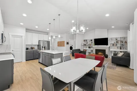 a bedroom with a bed and a lamp