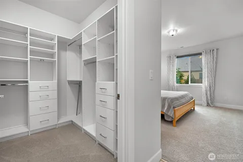 a view of a house with backyard porch and sitting area