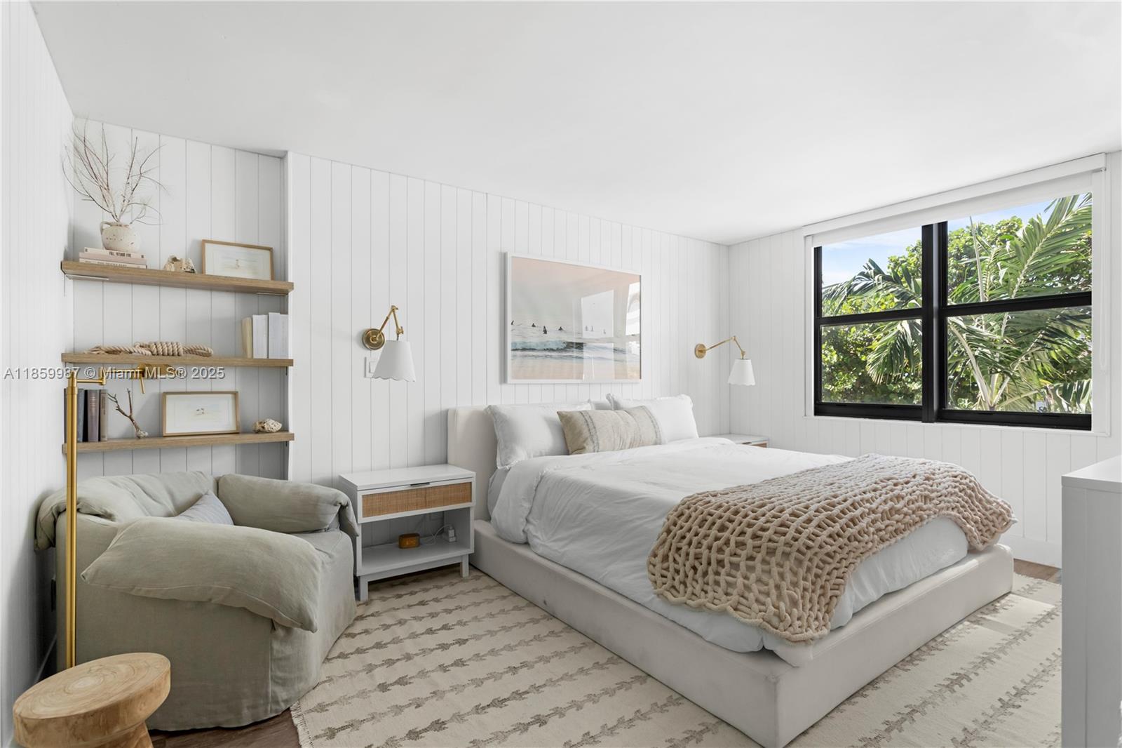 4301 Collins Avenue, Unit 207 Miami Beach, FL 33140 - Photo 15 of 34 a bedroom with a bed and a large window