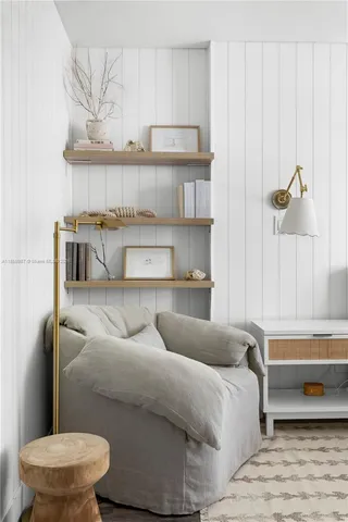 a bathroom with a toilet and a bathtub