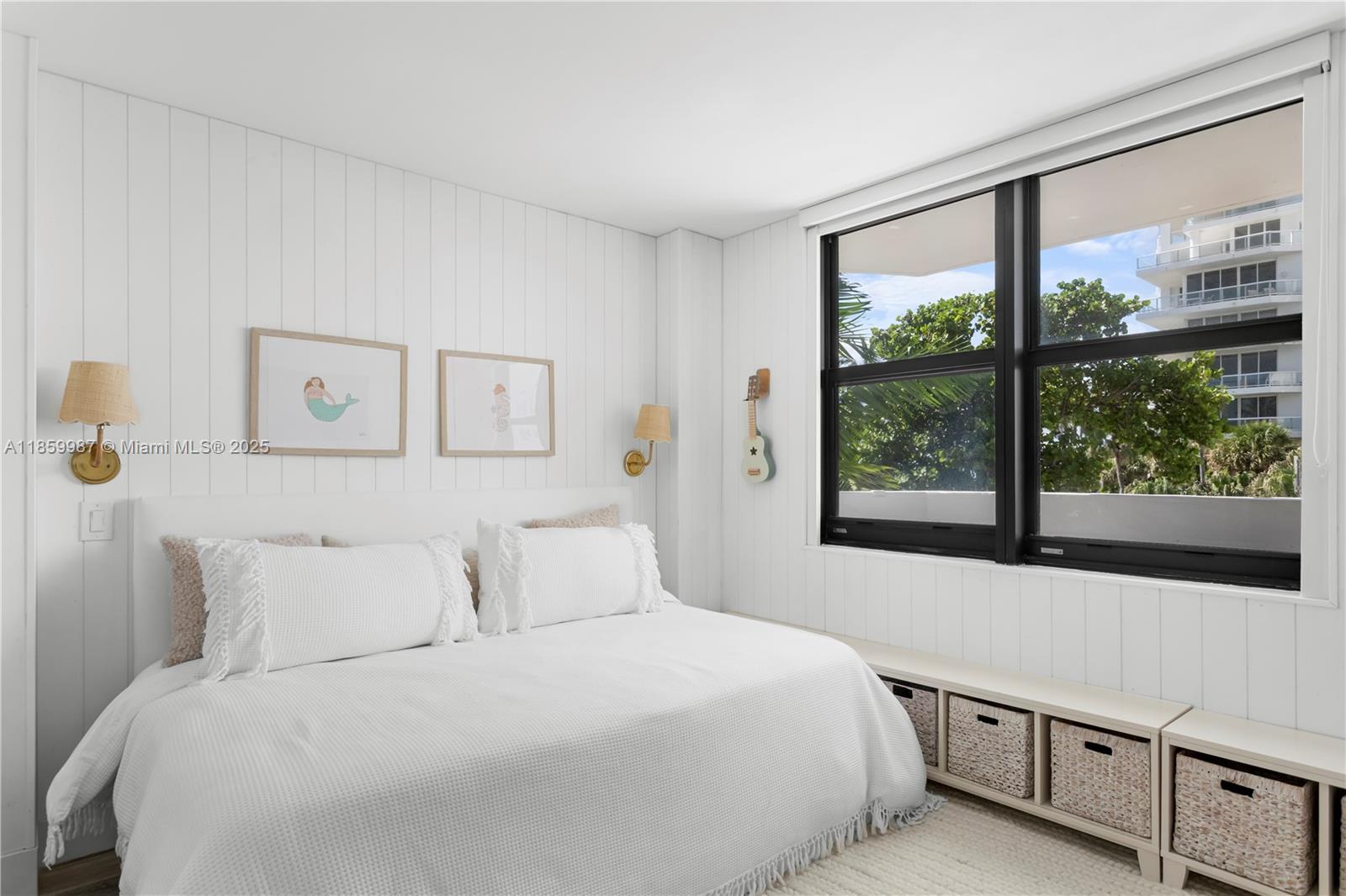 4301 Collins Avenue, Unit 207 Miami Beach, FL 33140 - Photo 23 of 34 a bedroom with a large bed and a large window