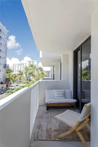 a view of a yard and a patio