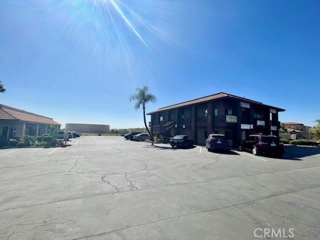 2176 West Foothill Boulevard, Unit C Upland, CA 91786 - Photo 8 of 8 a view of a house with a yard