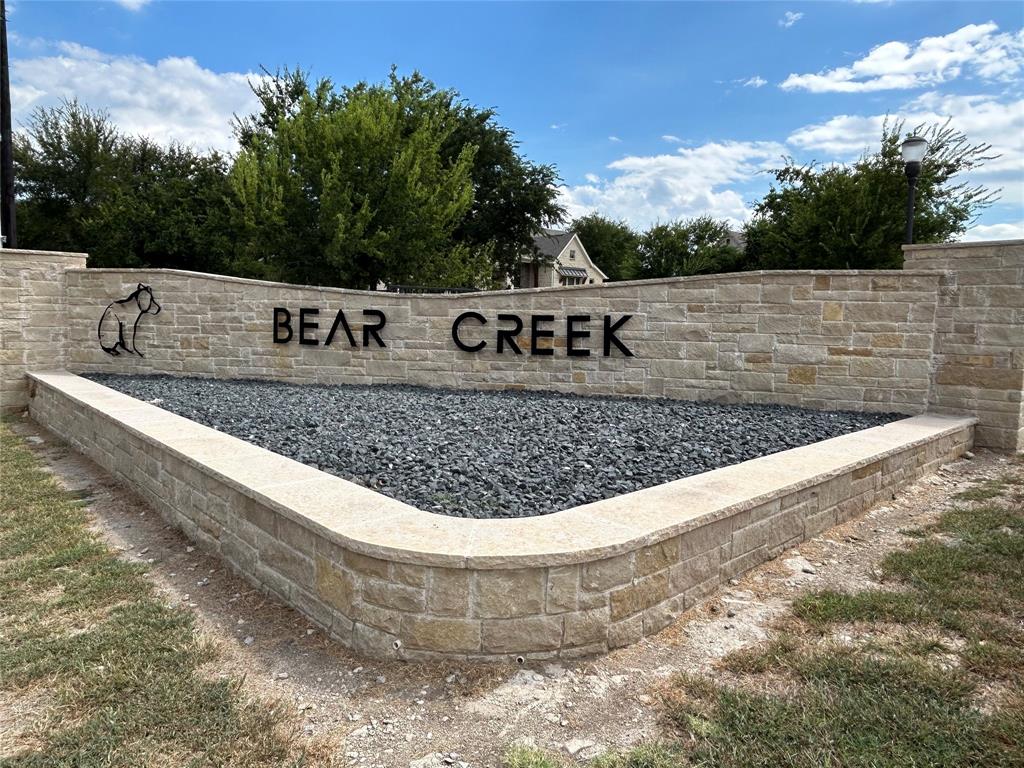 1000 Bear Creek Ranch Road Aledo, TX 76008 - Photo 2 of 12 a view of a dry yard with trees