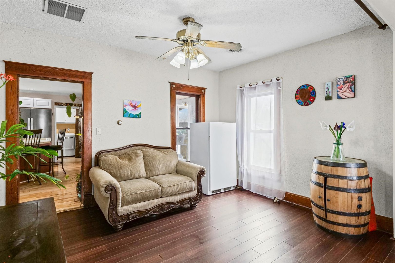 2210 Fogel Road Mahomet, IL 61853 - Photo 8 of 33 a living room with furniture and a wooden floor