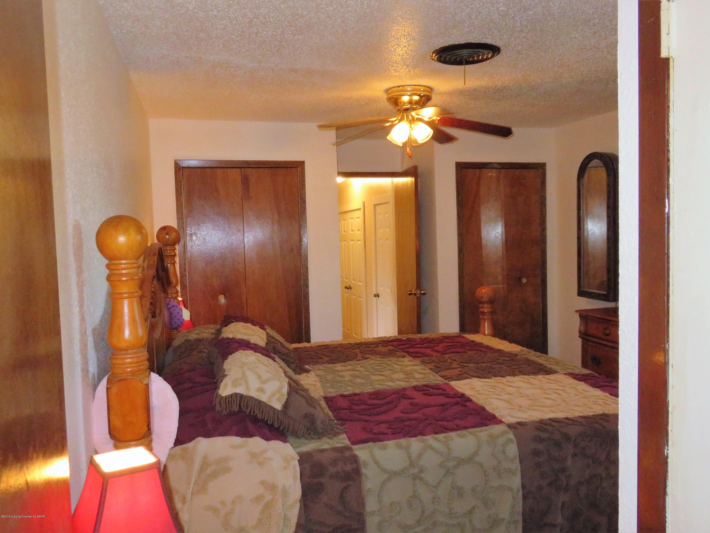 9613 River Road Amarillo, TX 79108 - Photo 14 of 29 Bedroom 2 with Attached BAthroom