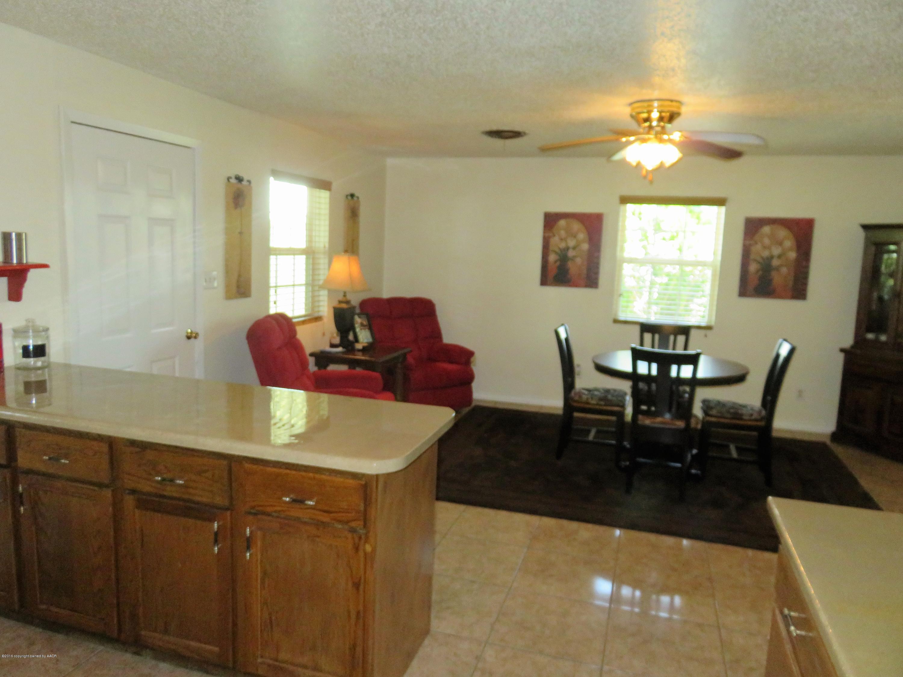 9613 River Road Amarillo, TX 79108 - Photo 9 of 29 From Kitchen into Living Room