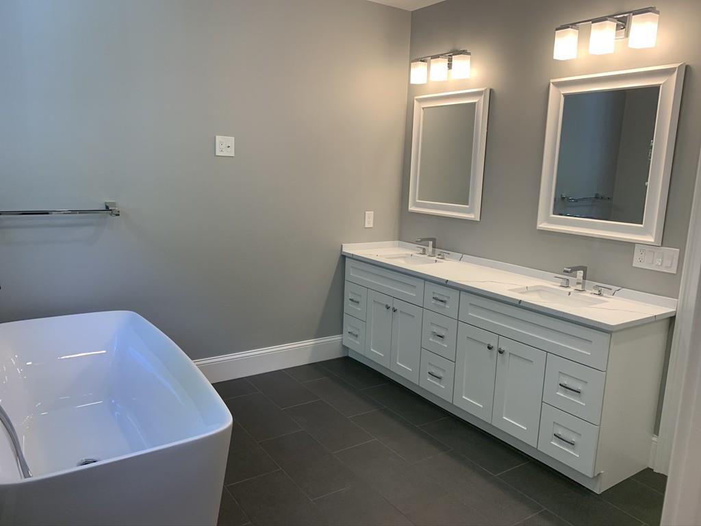 196 Reedsdale Road Milton, MA 02186 - Photo 12 of 20 a bathroom with a sink and a bathtub