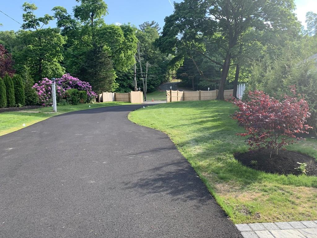 196 Reedsdale Road Milton, MA 02186 - Photo 2 of 20 a view of a park with large trees