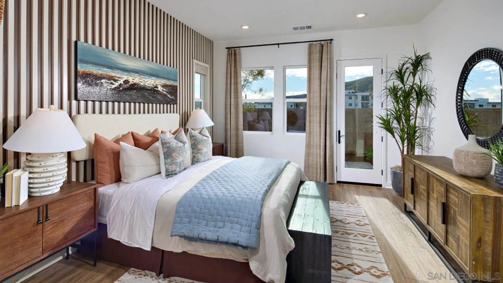 15366 Junipers Drive San Diego, CA 92129 - Photo 16 of 19 a bedroom with bed and a chandelier