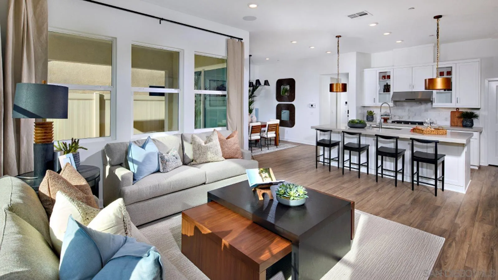 15366 Junipers Drive San Diego, CA 92129 - Photo 6 of 19 a living room with furniture kitchen and a large window