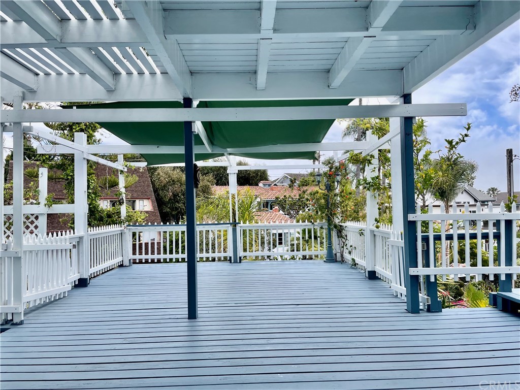 33881 Orilla Road Dana Point, CA 92629 - Photo 13 of 20 a view of a porch with wooden floor