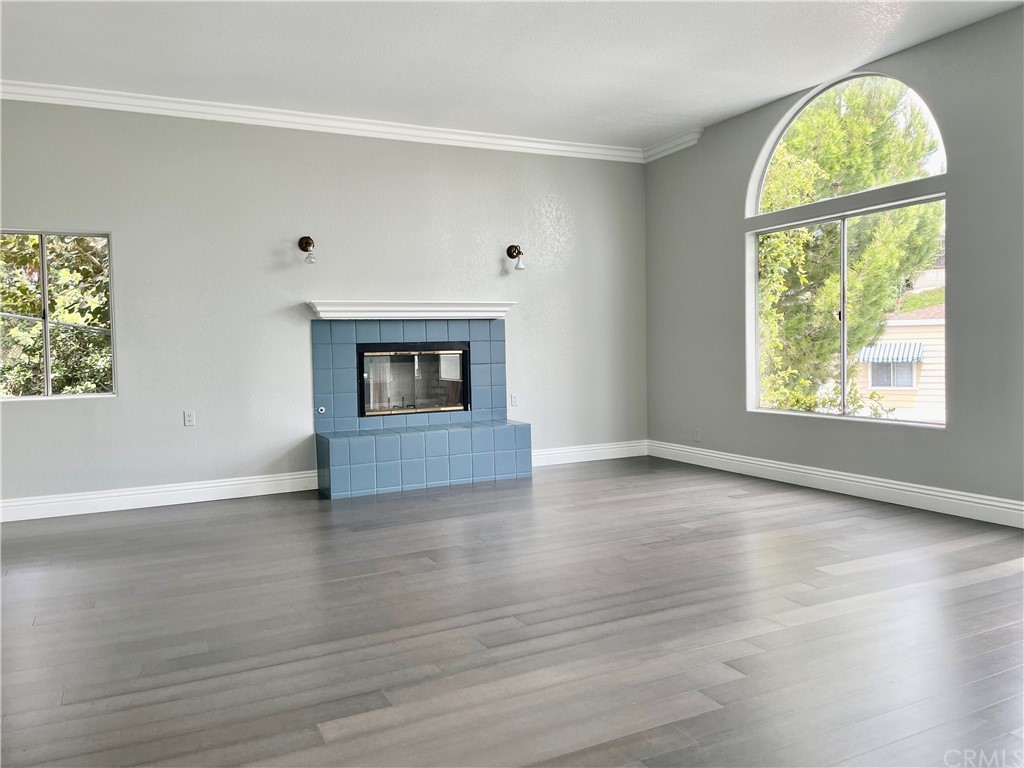 33881 Orilla Road Dana Point, CA 92629 - Photo 6 of 20 a view of an empty room with wooden floor and a window