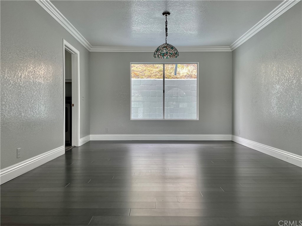 33881 Orilla Road Dana Point, CA 92629 - Photo 7 of 20 an empty room with wooden floor and window