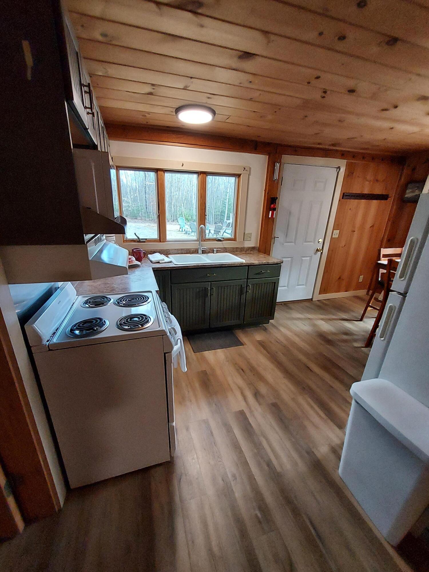 61 Floyd French Road Athens, ME 04912 - Photo 17 of 33 View to Kitchen from Living Room