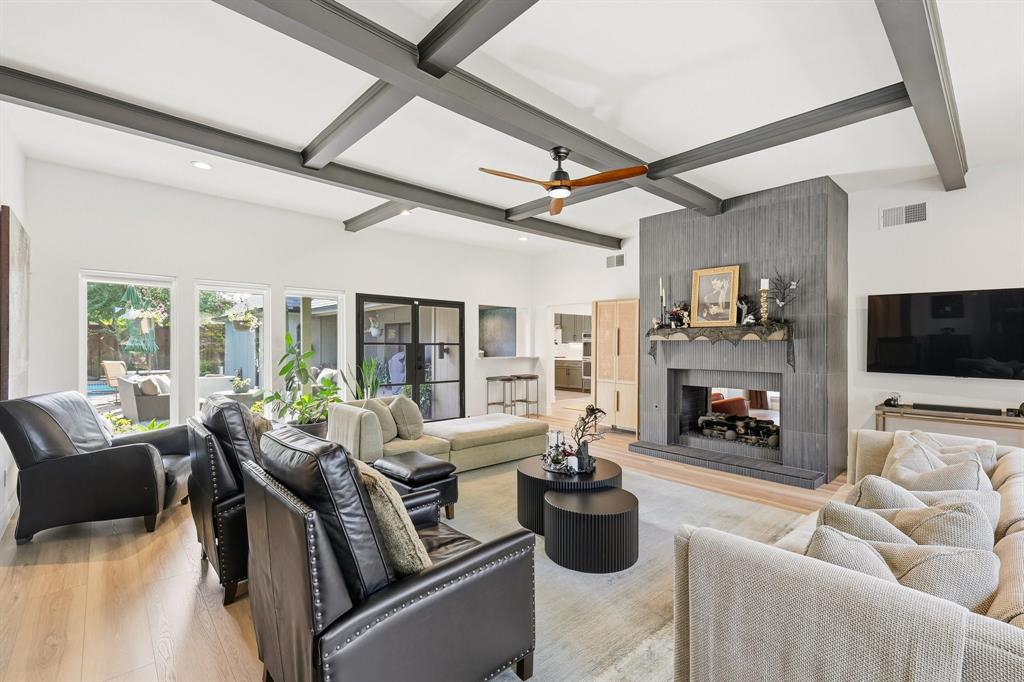 5516 Bent Trail Dallas, TX 75248 - Photo 5 of 32 a living room with furniture fireplace and flat screen tv