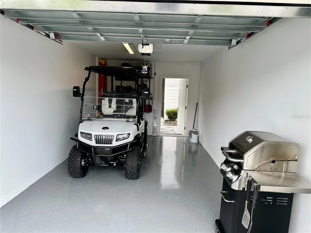 a view of a lake with a house in the background