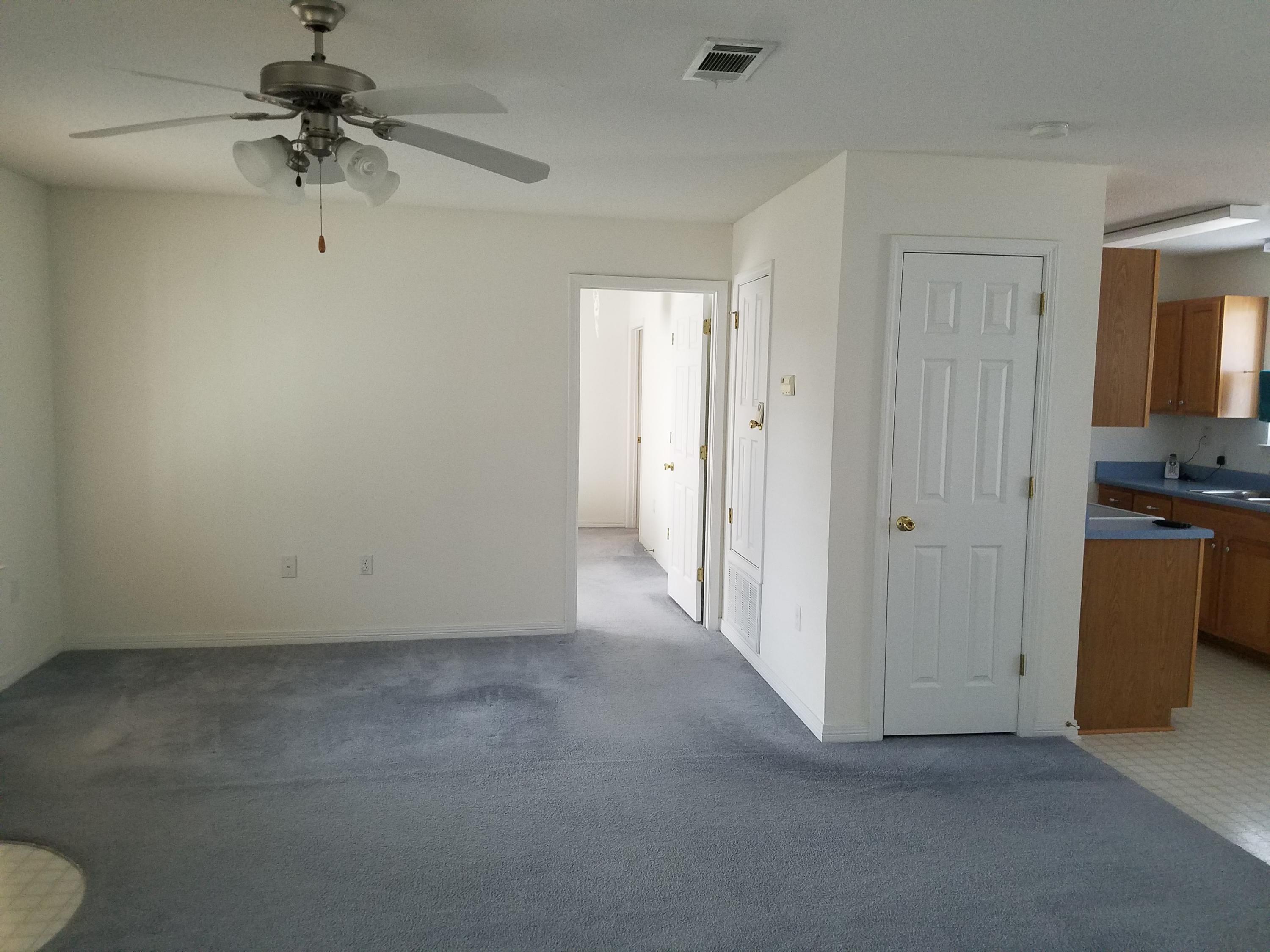 5368 Barbarosa Road Gulf Breeze, FL 32563 - Photo 12 of 17 a view of a room with a ceiling fan