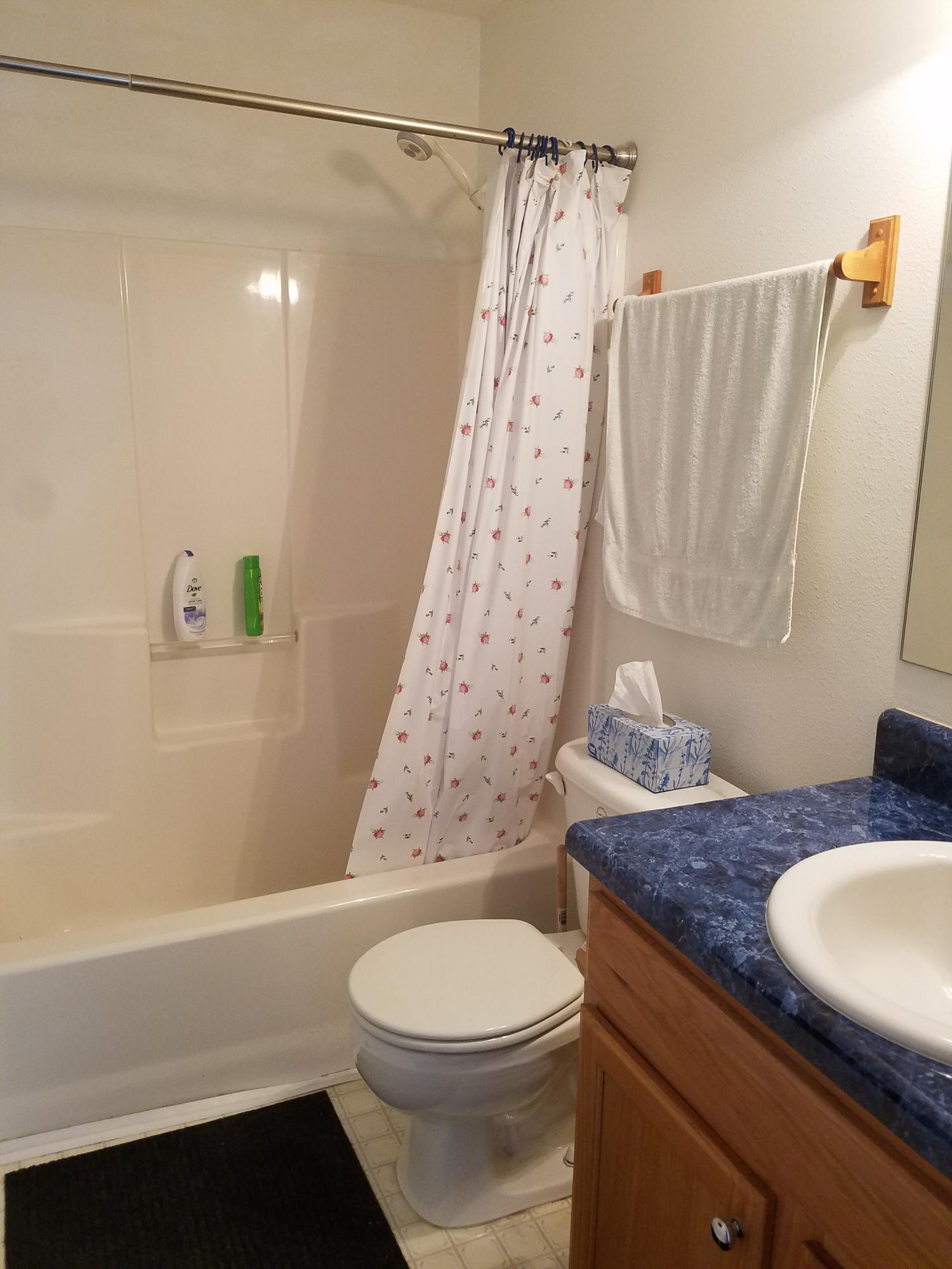 5368 Barbarosa Road Gulf Breeze, FL 32563 - Photo 15 of 17 a bathroom with a granite countertop sink toilet and shower