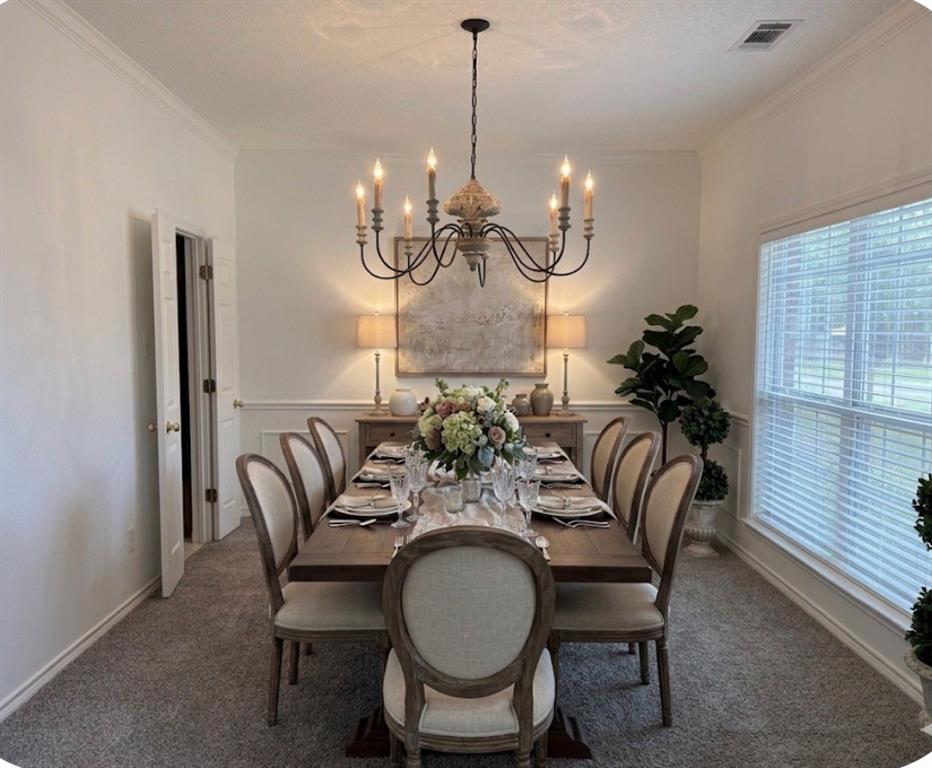 4214 Glistening Spring Rowlett, TX 75088 - Photo 11 of 32 Formal dining area virtually staged