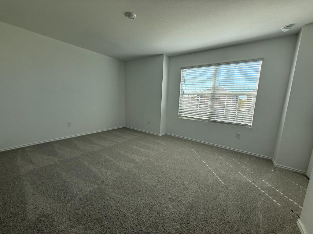 962 Soapstone Pass Maxwell, TX 78656 - Photo 15 of 23 an empty room with a window