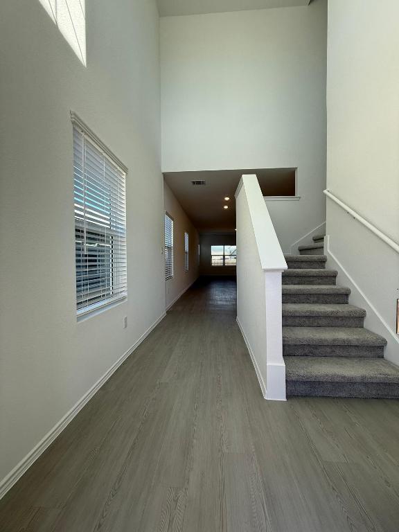 962 Soapstone Pass Maxwell, TX 78656 - Photo 3 of 23 a view of entryway and hall with wooden floor
