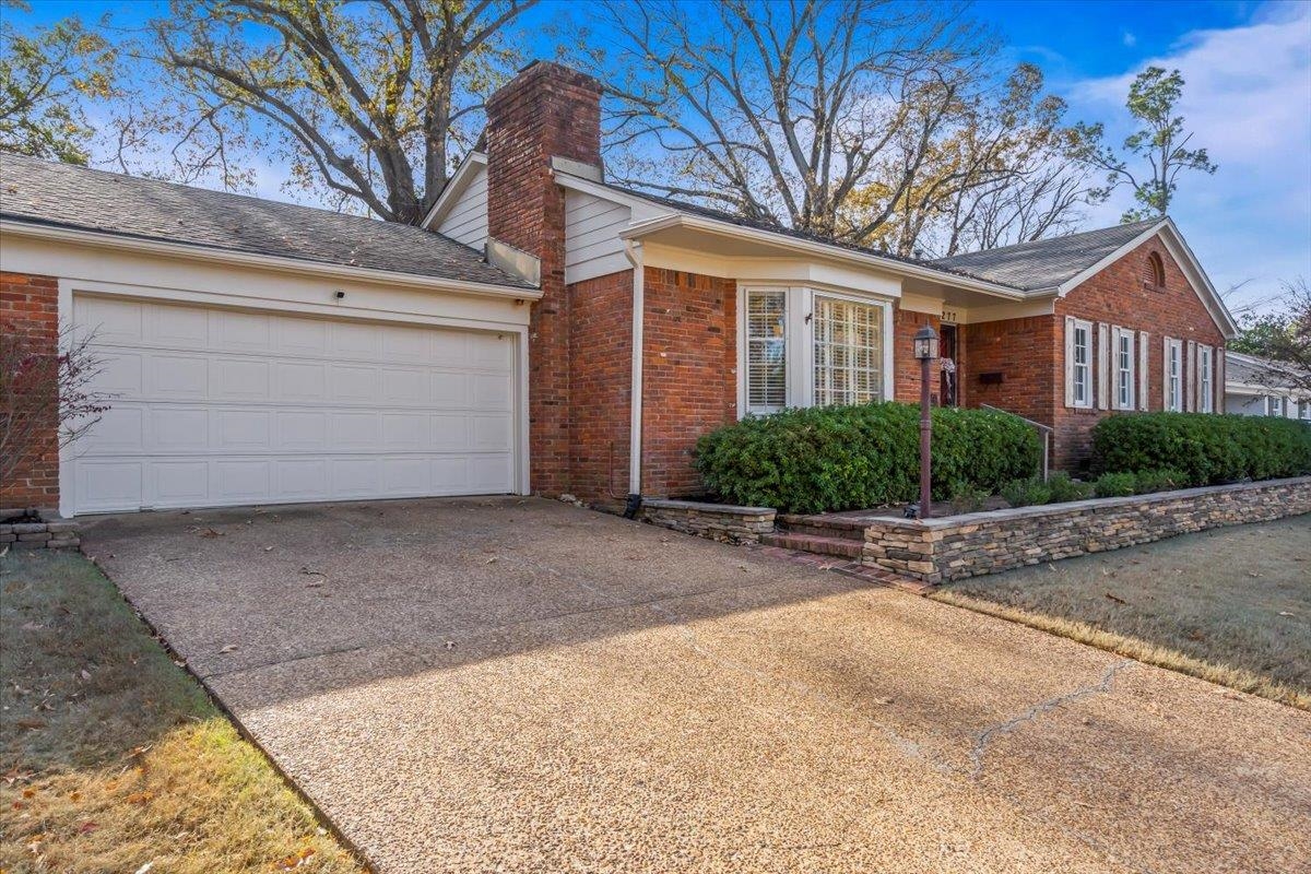 4277 Sequoia Road Memphis, TN 38117 - Photo 2 of 36 a view of a house with a street