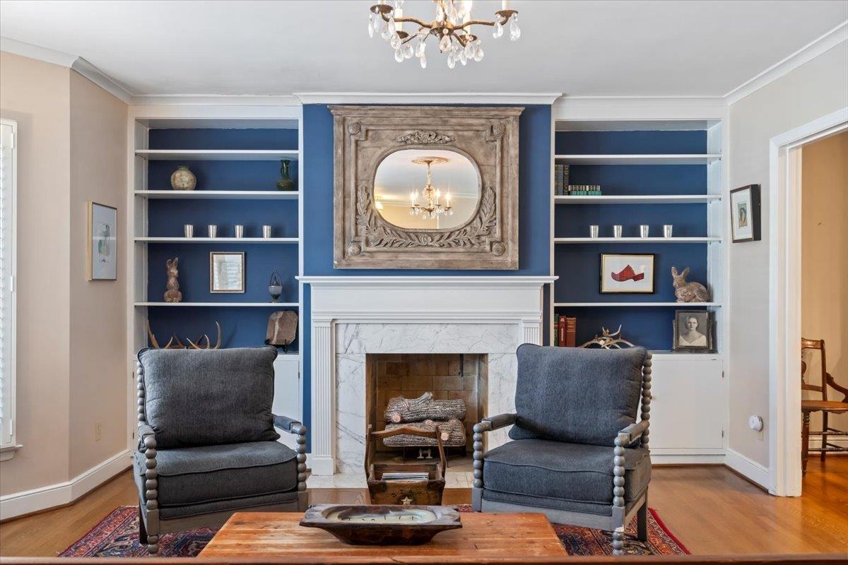 4277 Sequoia Road Memphis, TN 38117 - Photo 8 of 36 a living room with furniture and a fireplace