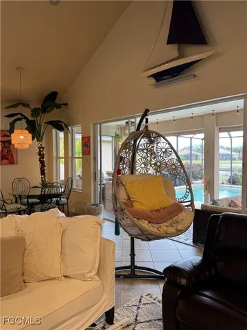 a bed with a white bed and a chair