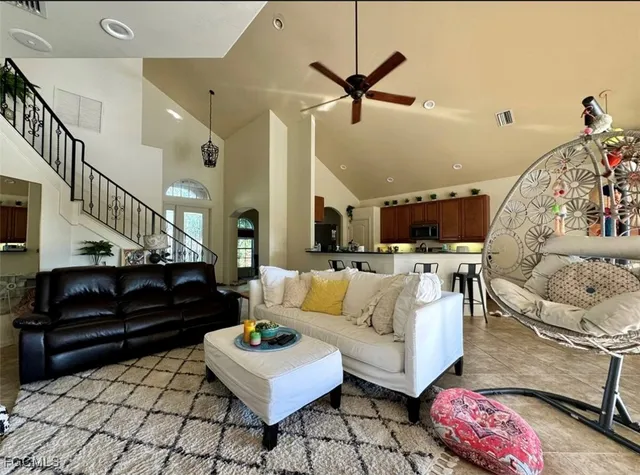 a living room with furniture and a table