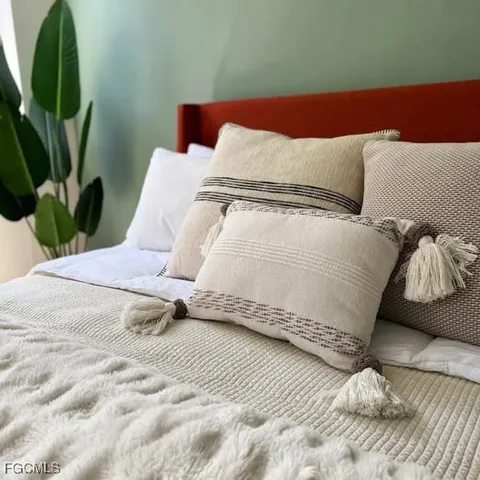 a room with a couch and a window