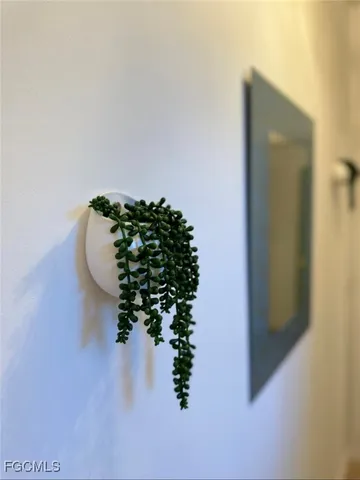 an aerial view of a house with a yard and garden