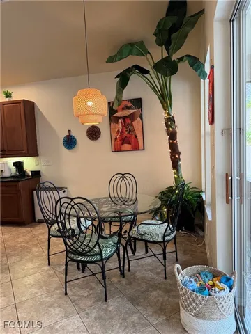 a kitchen with granite countertop a sink and cabinets