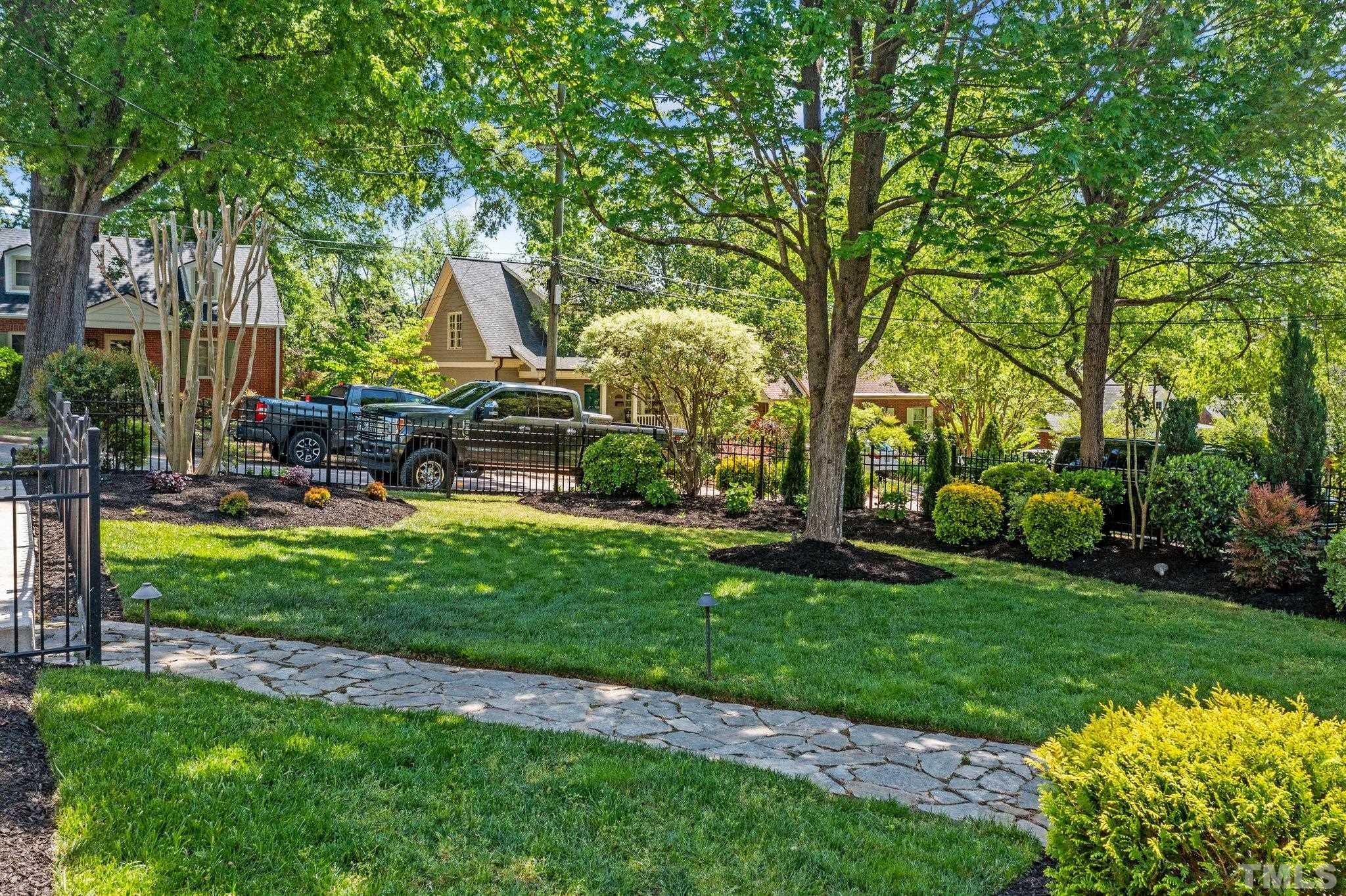 1625 Lorraine Road Raleigh, NC 27607 - Photo 5 of 6 a view of a chair and table of the garden