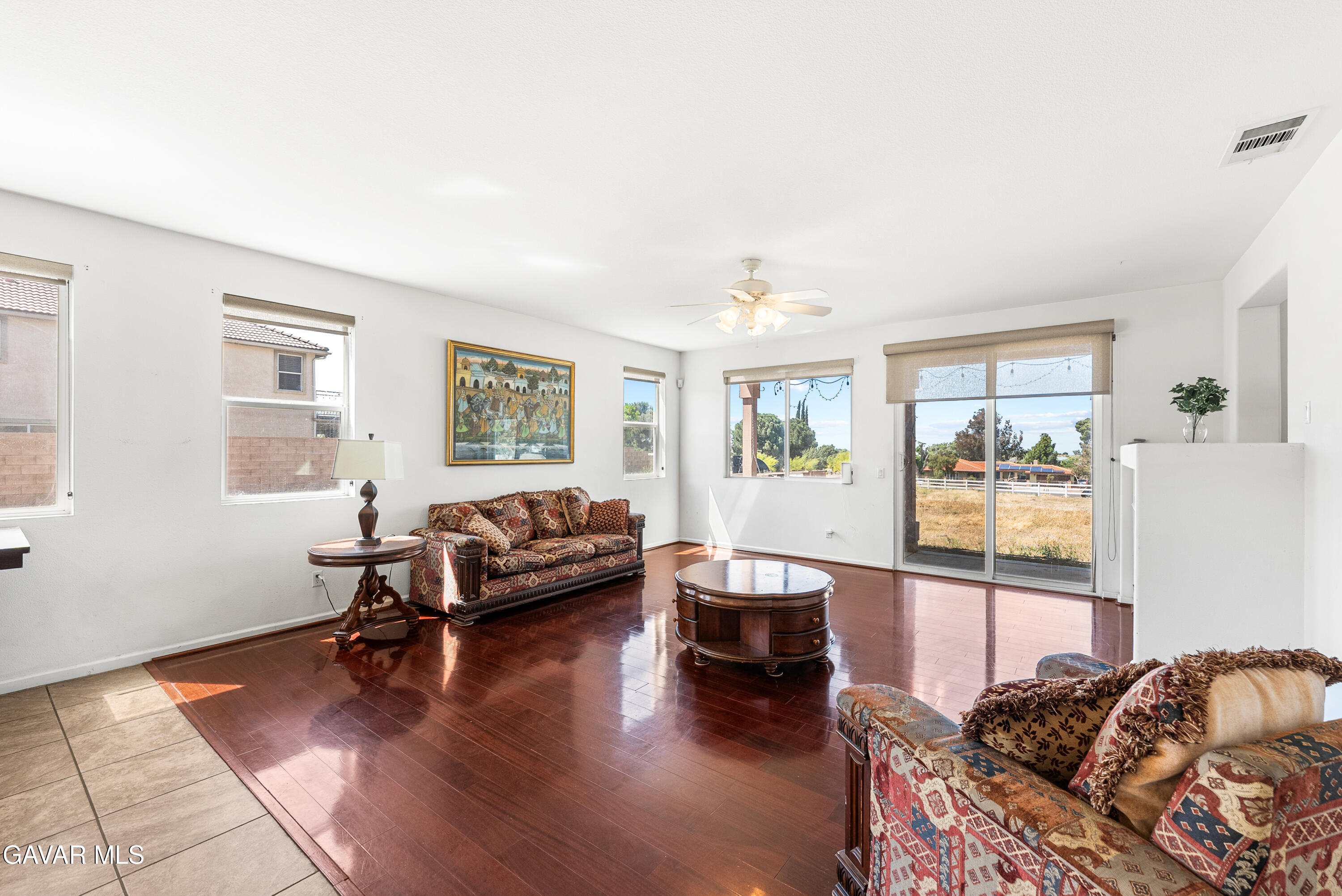 658 Lago Lindo Road Palmdale, CA 93550 - Photo 22 of 91 a living room with furniture and a window