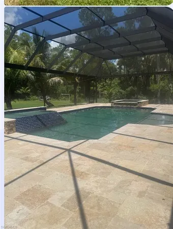 a view of a backyard of a house