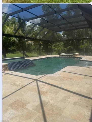 a view of a backyard of a house