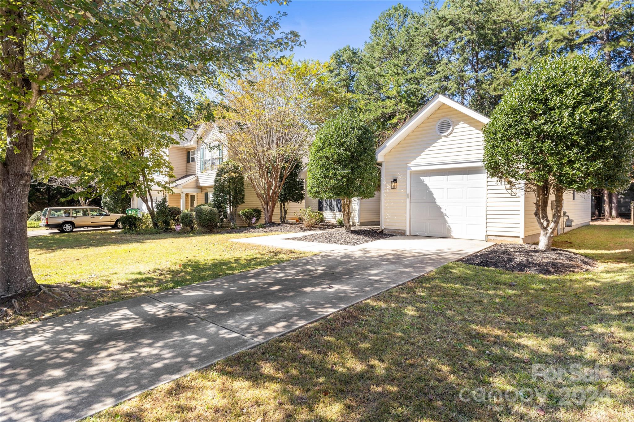 4909 Deerton Road Charlotte, NC 28269 - Photo 2 of 31 a view of a house with a yard
