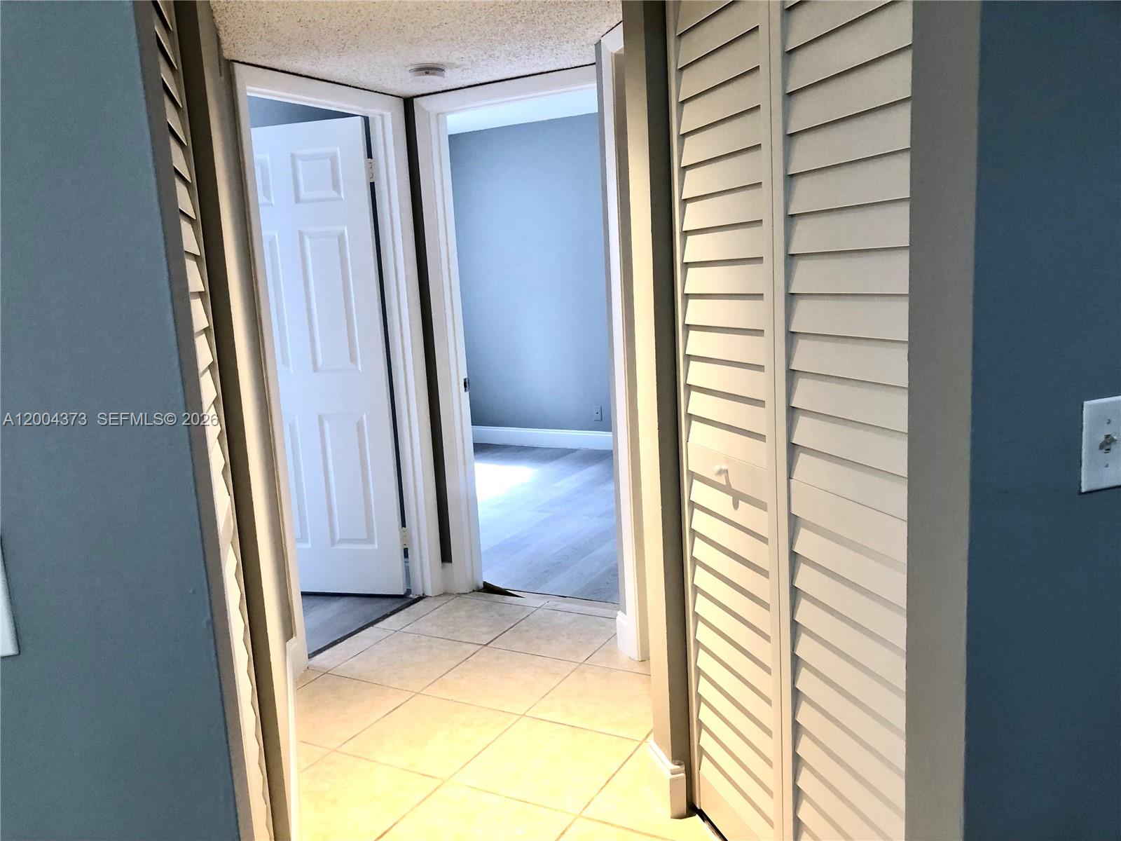 8761 Wiles Road, Unit 306 Coral Springs, FL 33067 - Photo 11 of 26 a view of front door
