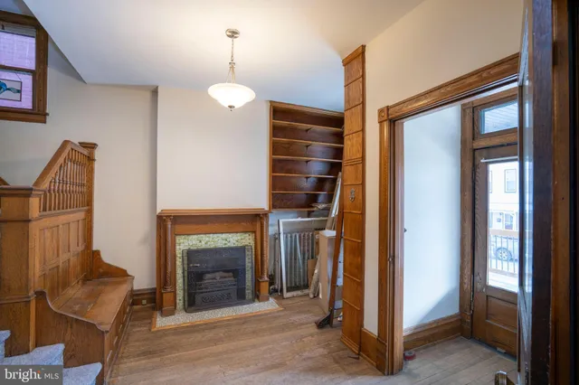 a view of livingroom with furniture and fireplace