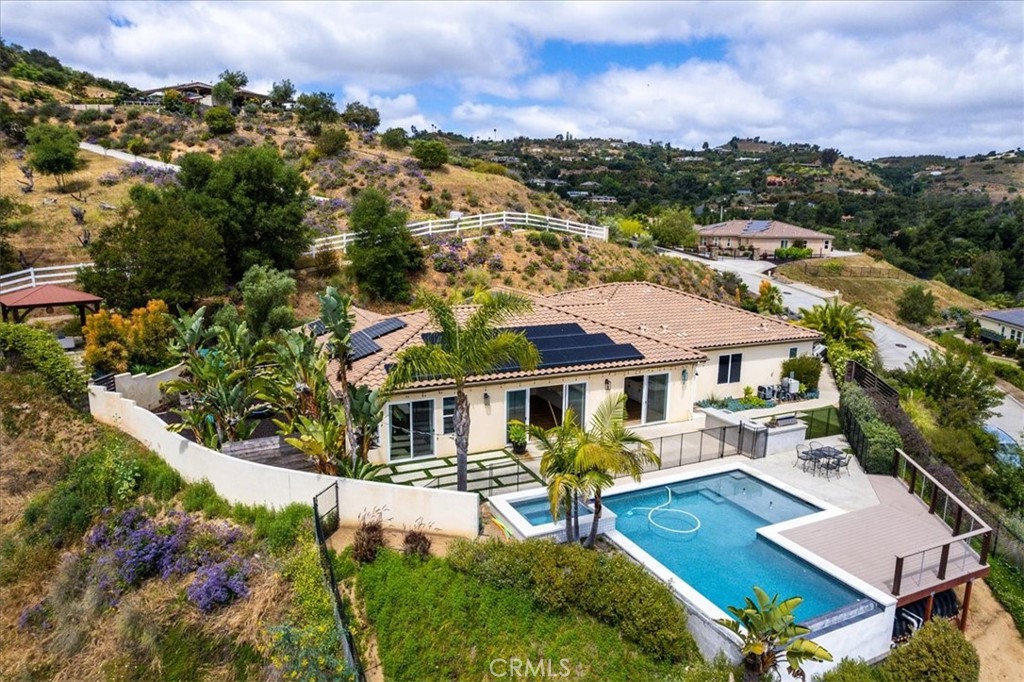 2836 Mesa Grove Road Fallbrook, CA 92028 - Photo 16 of 54 an aerial view of residential houses with outdoor space and trees