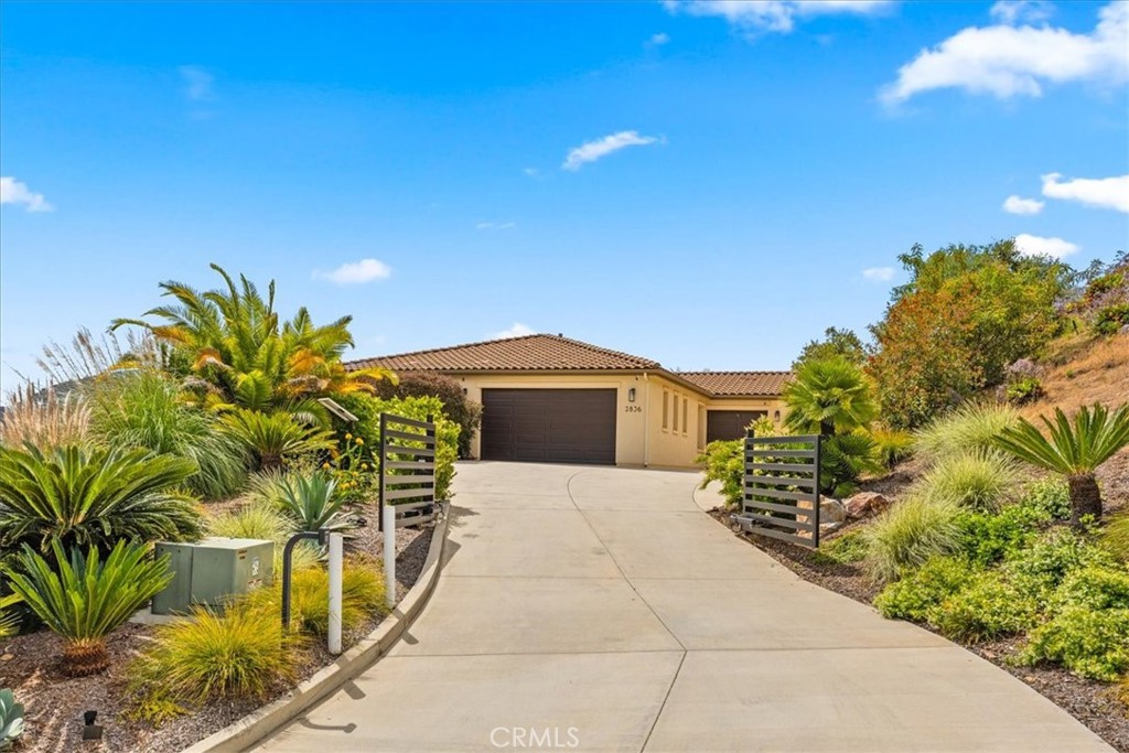 2836 Mesa Grove Road Fallbrook, CA 92028 - Photo 17 of 54 a pathway of a house with a yard