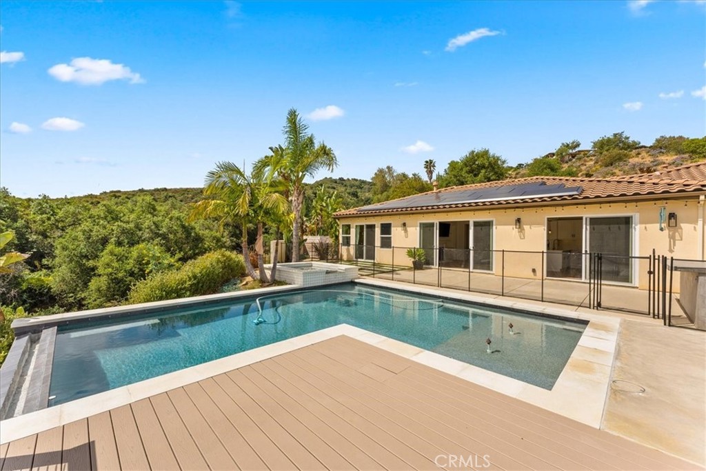 2836 Mesa Grove Road Fallbrook, CA 92028 - Photo 27 of 54 a view of a house with pool and wooden floor