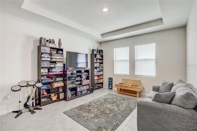 a bedroom with a bed and a cabinets