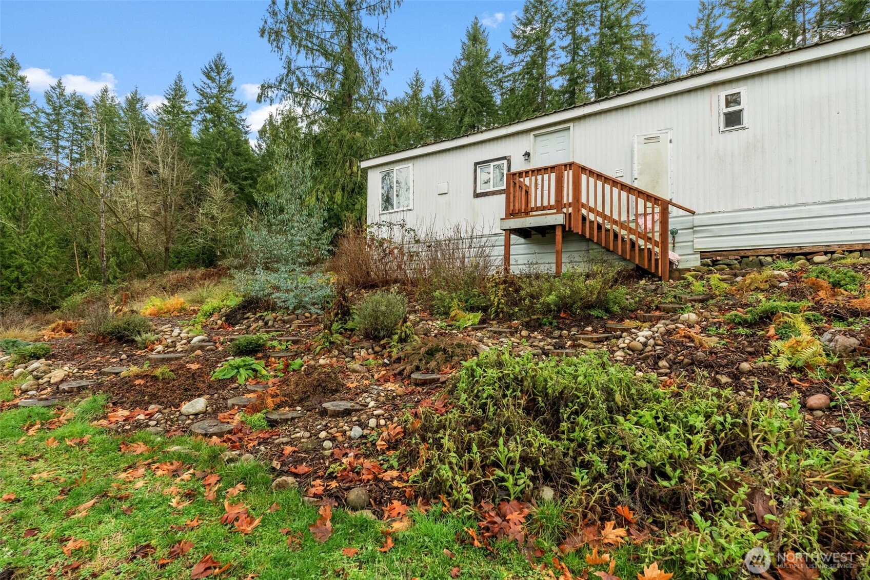 18818 Slough Lane Southeast Yelm, WA 98597 - Photo 25 of 39 a view of a house with a yard