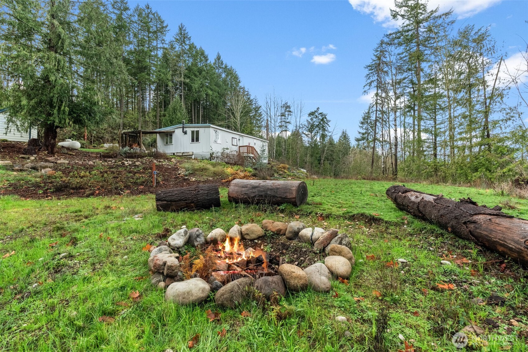 18818 Slough Lane Southeast Yelm, WA 98597 - Photo 28 of 39 a garden view with a sitting space